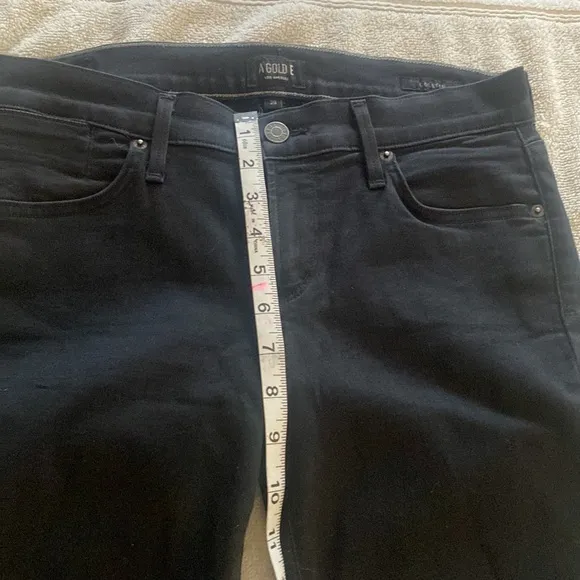 AGOLDE from Bloomingdale’s stretchy black washed Colette style skinny jeans
