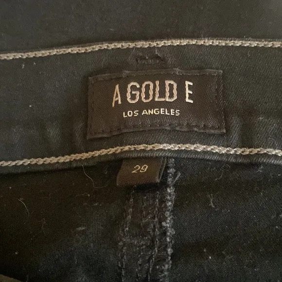 AGOLDE from Bloomingdale’s stretchy black washed Colette style skinny jeans