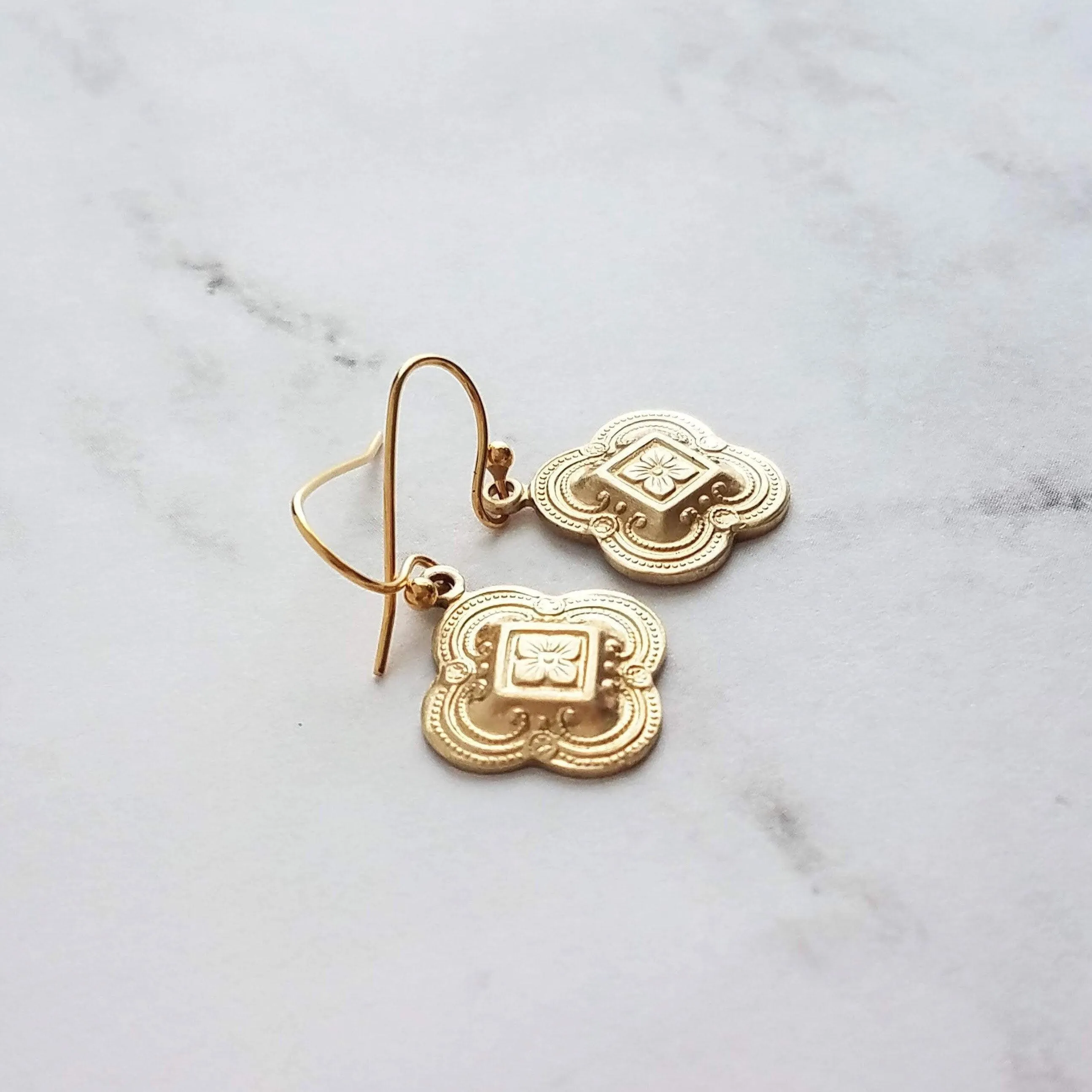 Clover Earring - sweet little gold stamped 4 leaf/lobe Irish charm on small plain ear hook - raised design w/ boho ornate detail