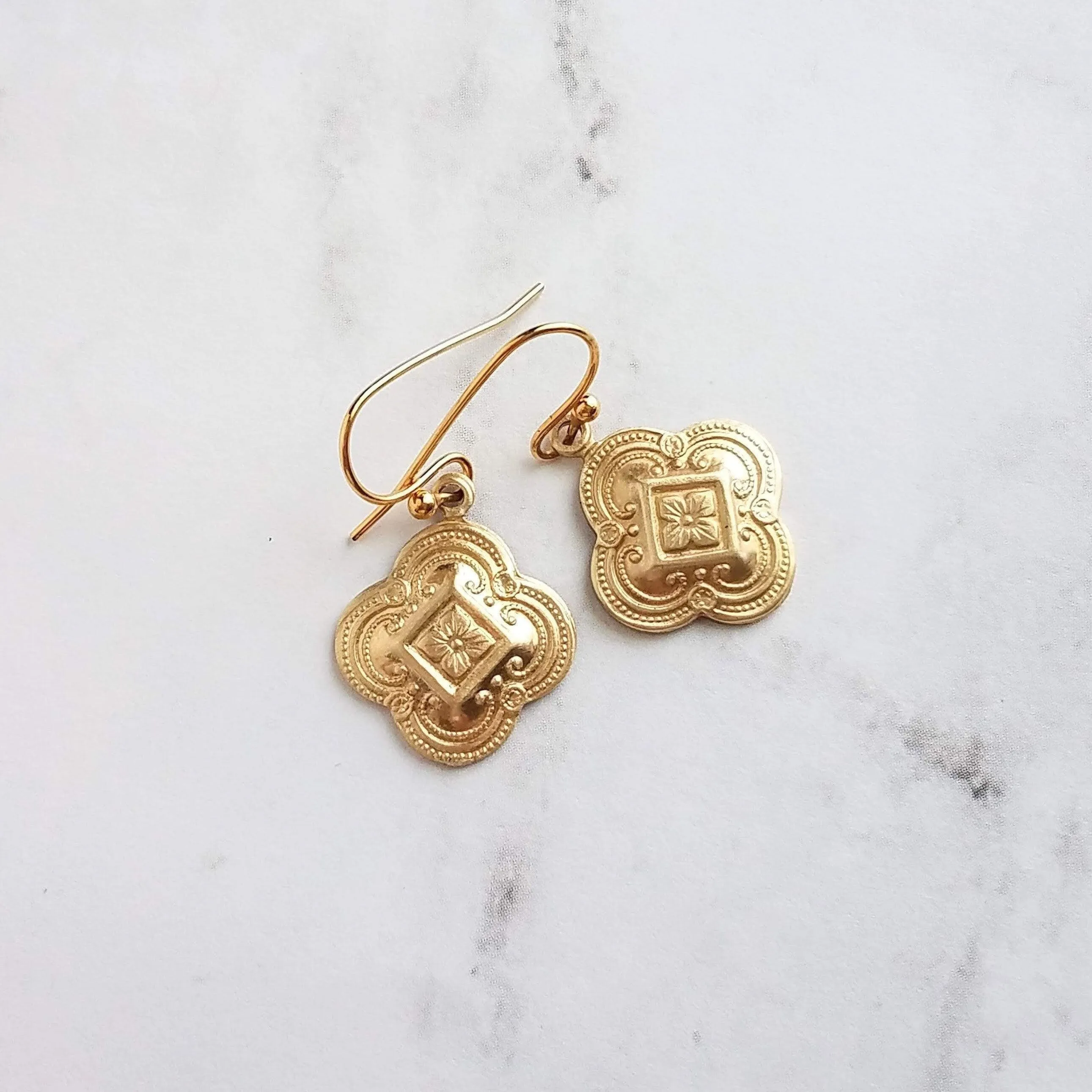 Clover Earring - sweet little gold stamped 4 leaf/lobe Irish charm on small plain ear hook - raised design w/ boho ornate detail
